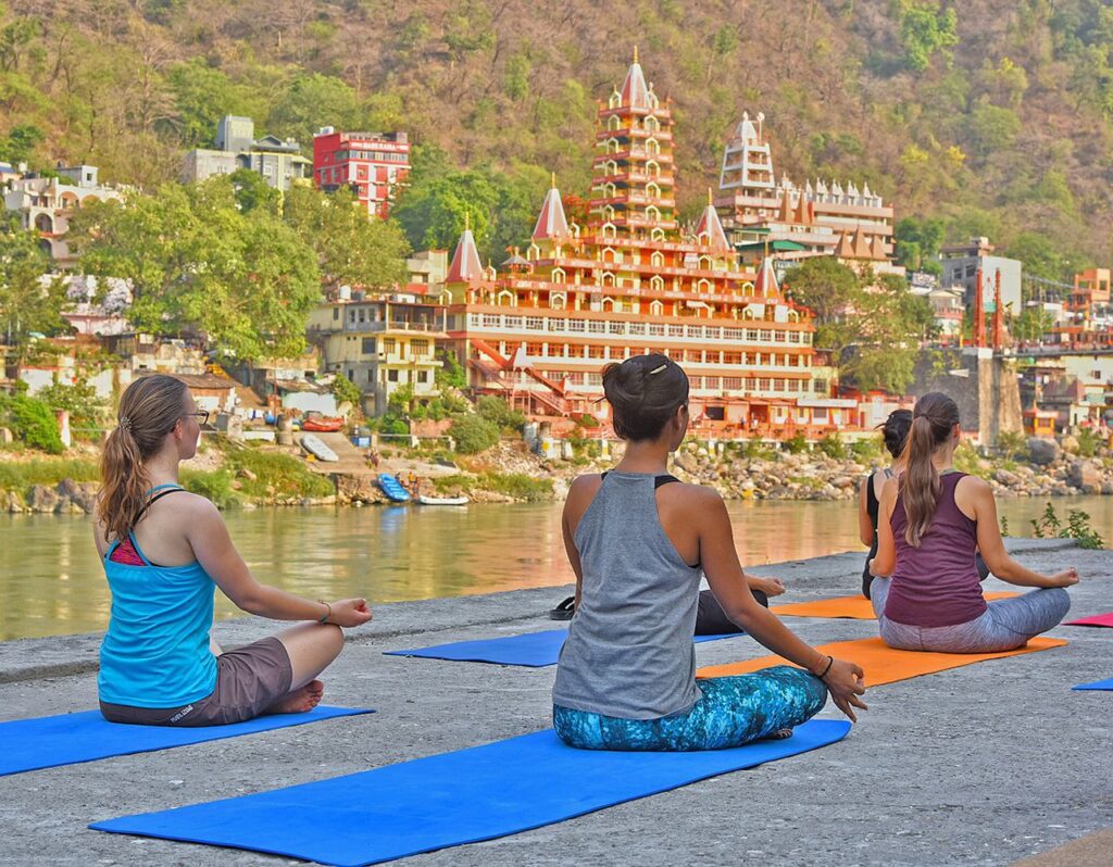 Rishikesh town with Lakshman Jhula over the Ganga River and surrounding hills