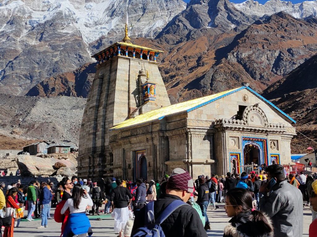 Kedarnath temple with snow-covered mountains in the background