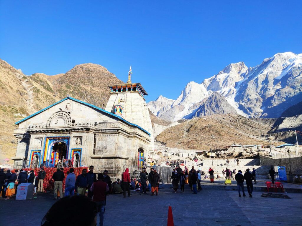 Kedarnath temple with snow-covered mountains in the background